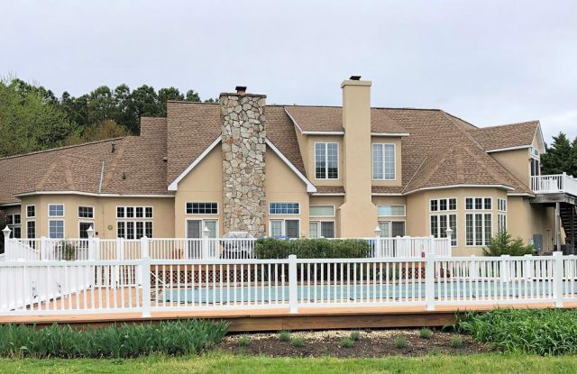 A residential roof placement on a luxurious home in Maryland